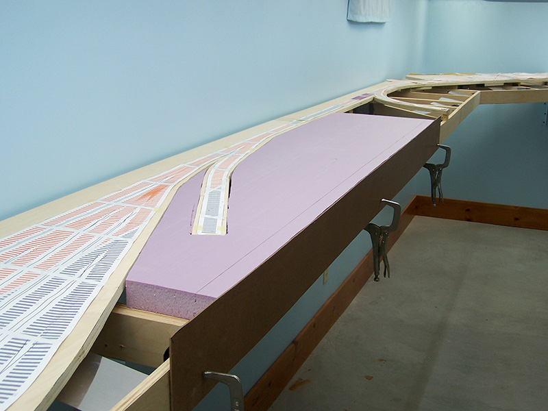 Condo/Loft with a model railroad shelving/benchwork assembly Model